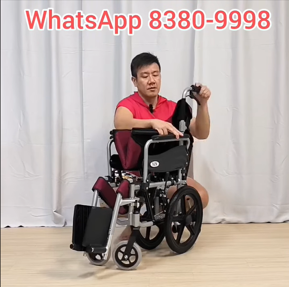 Staff delivering a rental wheelchair in Singapore